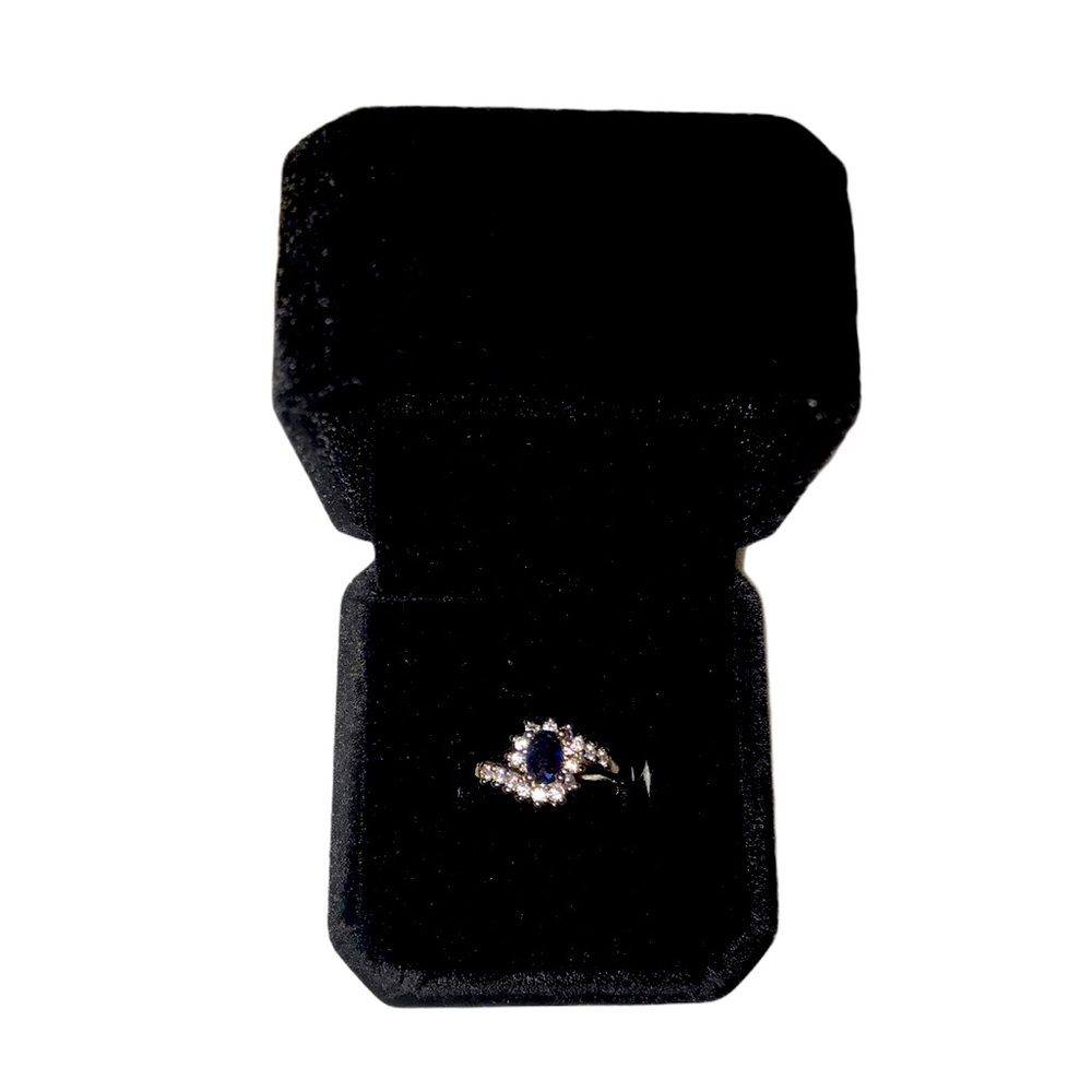 Sterling Silver ring with faux Sapphire, size 7.